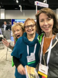Lee An, Judy, and Susan in the exhibition hall at the 2018 RMDC