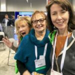 Lee An, Judy, and Susan in the exhibition hall at the 2018 RMDC