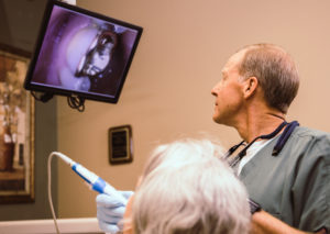 Dr. Albers using intra oral camera